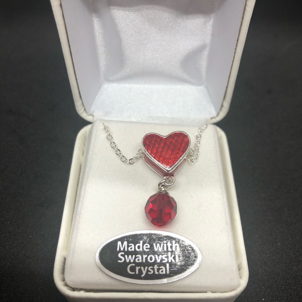 Heart shaped necklace made with Swarovski Crystals. Ruby red beautiful necklace